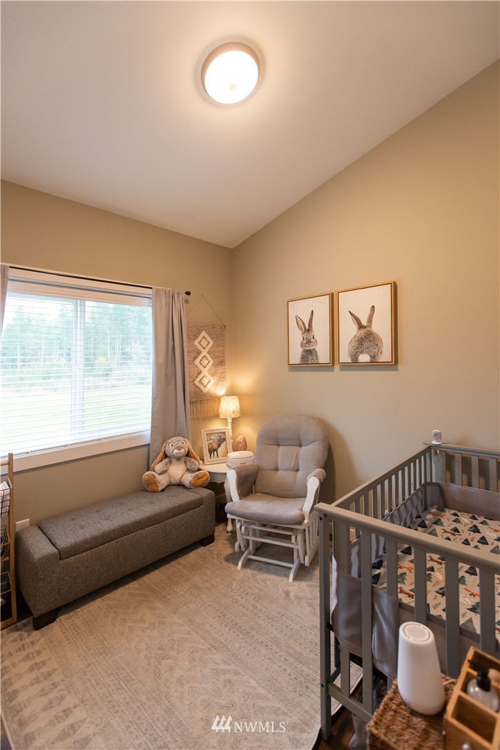800 Logan Hill Road Chehalis, WA 98532 - Photo 23 of 36 a living room with furniture and a window