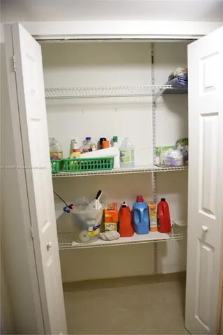 a utility room with lots of baby toys