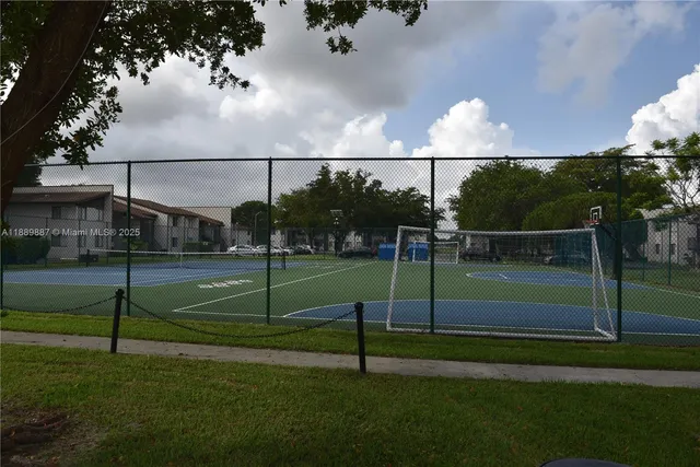 a view of street with parked cars
