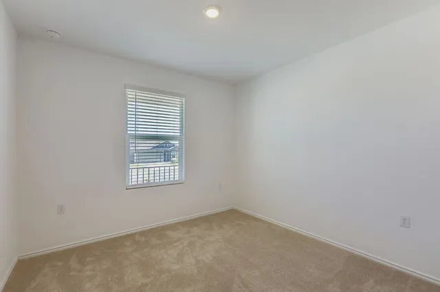a bathroom with a sink toilet and a mirror