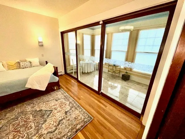 a living room with furniture and a rug