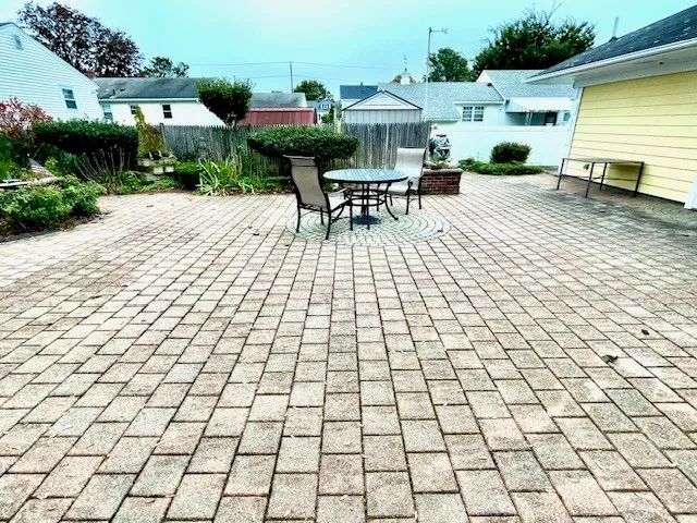 a kitchen with stainless steel appliances a refrigerator and a stove