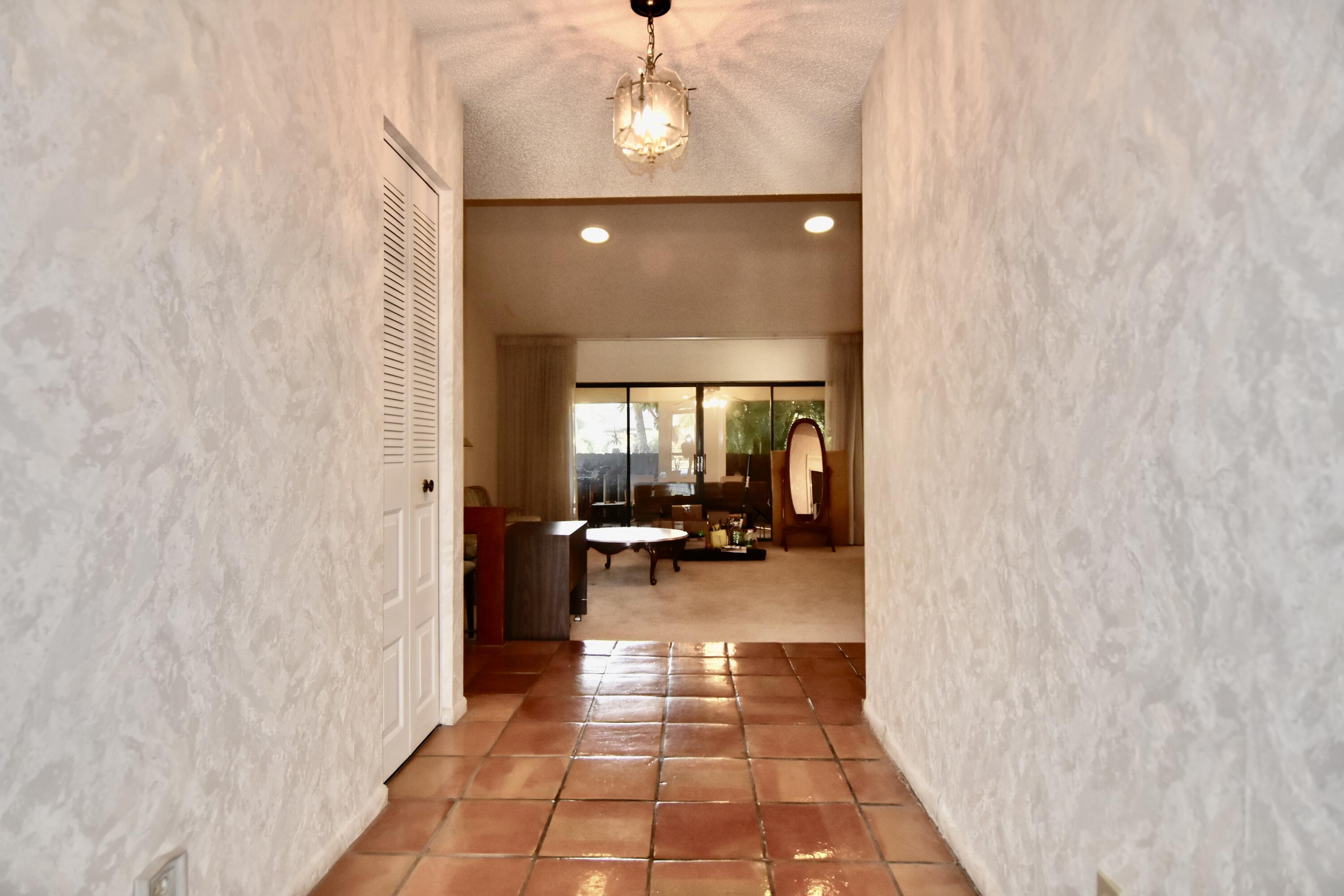 18101 Grove Avenue Boca Raton, FL 33498 - Photo 2 of 12 a very nice looking room with a large window and couch