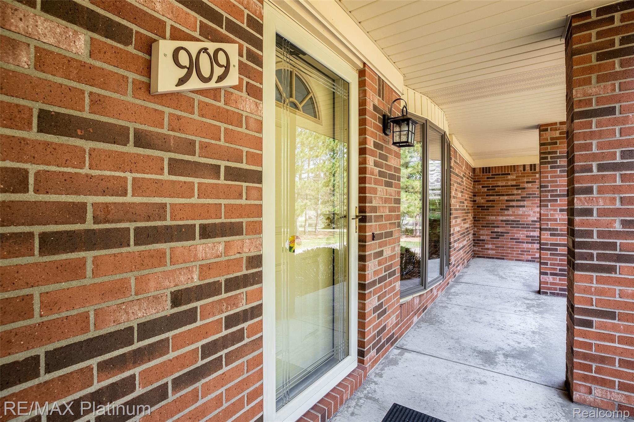 909 Chase Lake Road Howell, MI 48855 - Photo 3 of 37 A very welcoming front porch entrance!