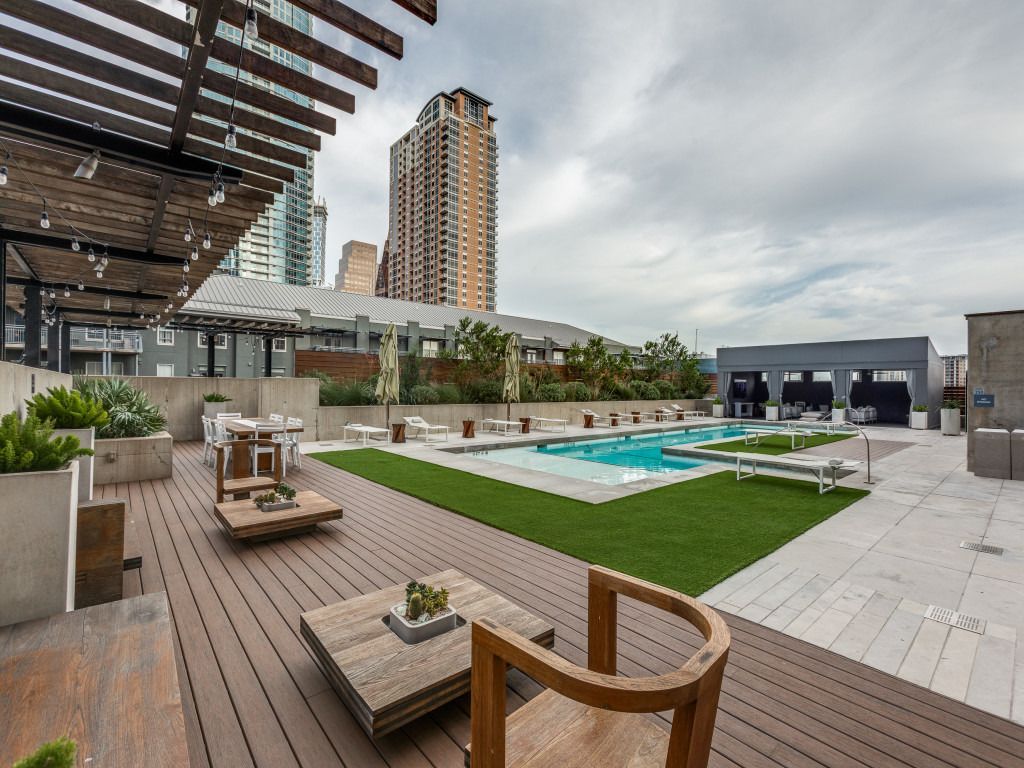 210 Lavaca Street, Unit 1801 Austin, TX 78701 - Photo 21 of 25 a view of a patio with chairs and plants
