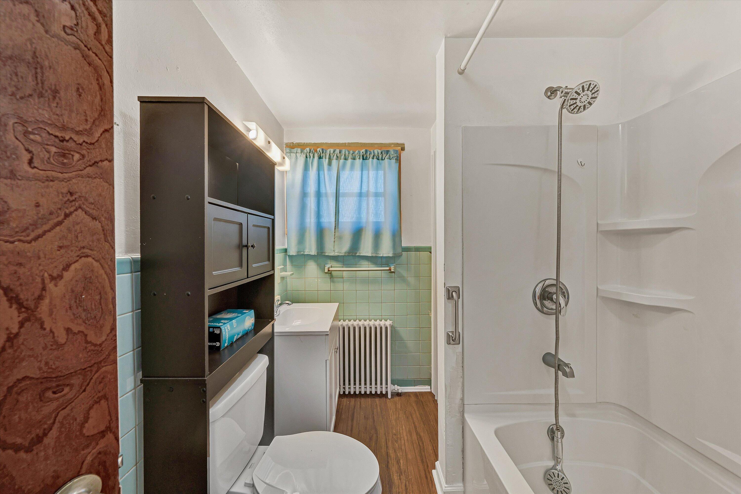 2356 West Riverside Drive Salem, VA 24153 - Photo 11 of 18 a bathroom with a sink toilet and shower