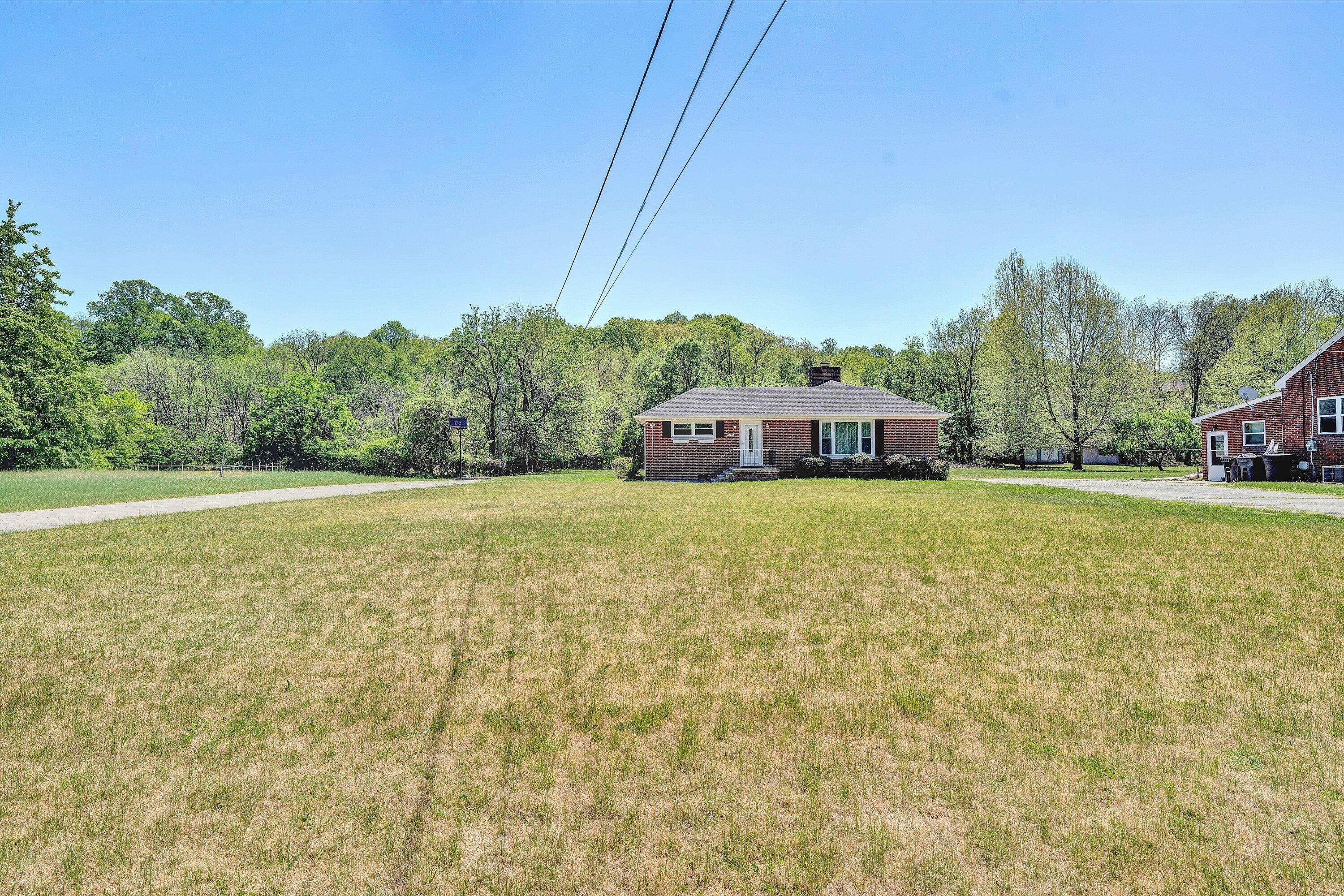 2356 West Riverside Drive Salem, VA 24153 - Photo 18 of 18 a view of a house with a yard