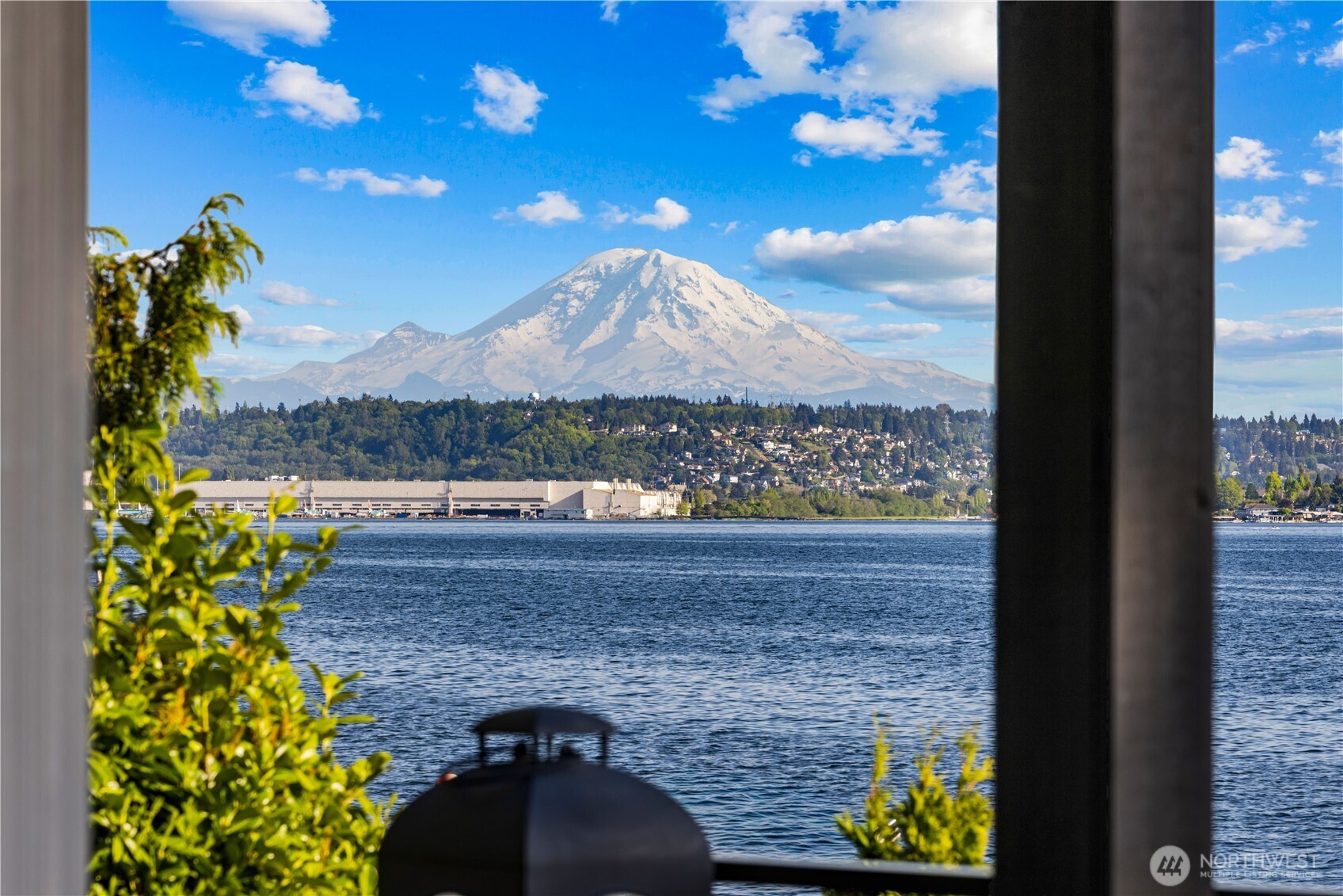 8097 West Mercer Way Mercer Island, WA 98040 - Photo 13 of 40 a view of a lake from a balcony
