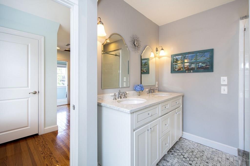 37 Damon Road Scituate, MA 02066 - Photo 26 of 39 a bathroom with a sink and a mirror