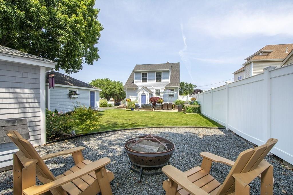 37 Damon Road Scituate, MA 02066 - Photo 36 of 39 a view of an house with backyard space and patio