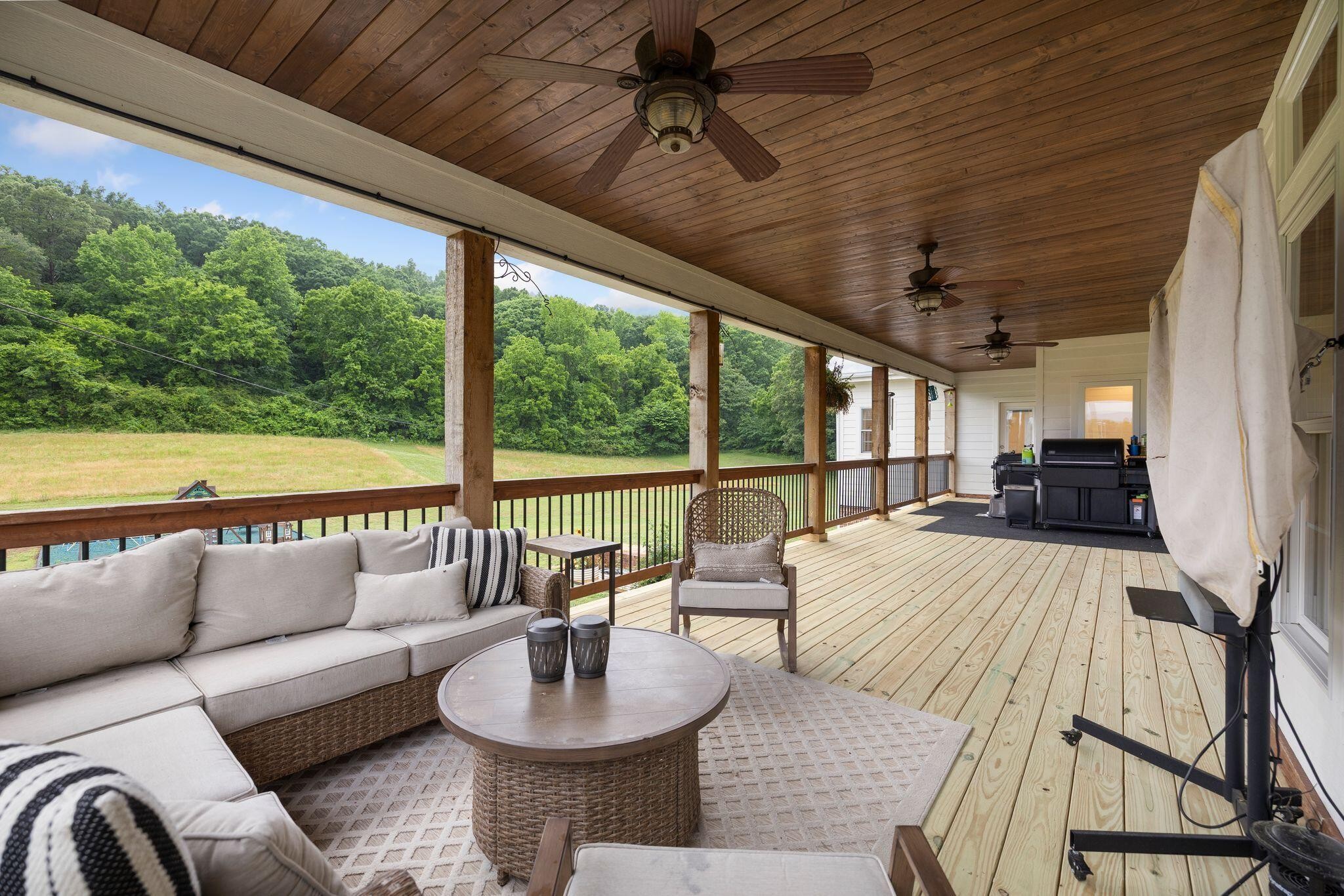 6866 Daus Mountain Road Whitwell, TN 37397 - Photo 36 of 49 a outdoor space with patio furniture and a potted plant