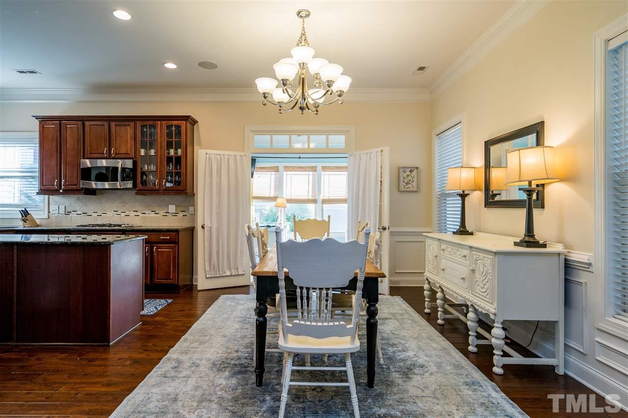 1528 Rodessa Run Raleigh, NC 27607 - Photo 11 of 30 Sought after dining space that is in the heart of the home---the middle of the kitchen/living room/sunroom.
