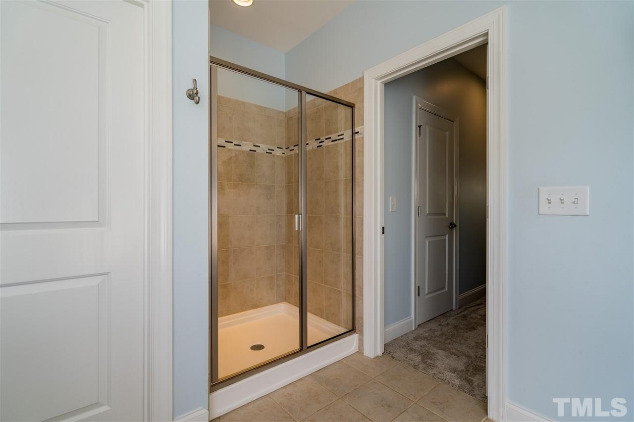 1528 Rodessa Run Raleigh, NC 27607 - Photo 24 of 30 Ceramic tile, two separate sinks, granite counters, garden tub, separate shower, separate water closet.