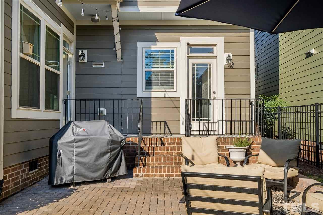 1528 Rodessa Run Raleigh, NC 27607 - Photo 27 of 30 Oversized brick patio in one of the largest backyards in Inside Wade.