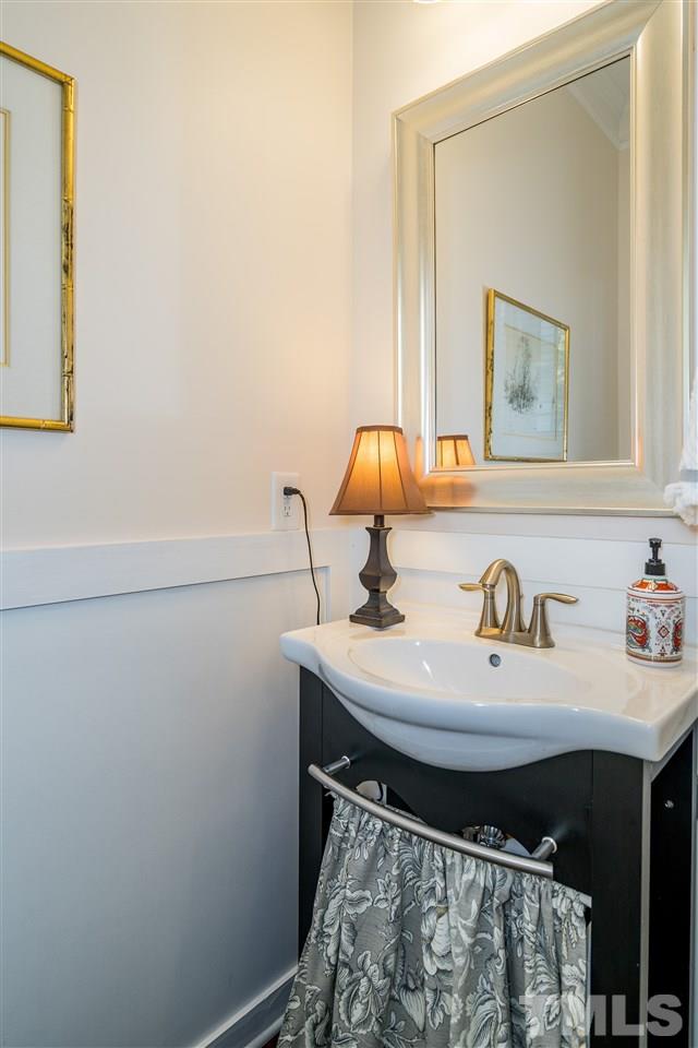 1528 Rodessa Run Raleigh, NC 27607 - Photo 6 of 30 Downstairs powder room is great for guests and having a bathroom on the main level for everyday living.