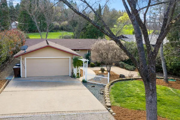 a house view with a garden space