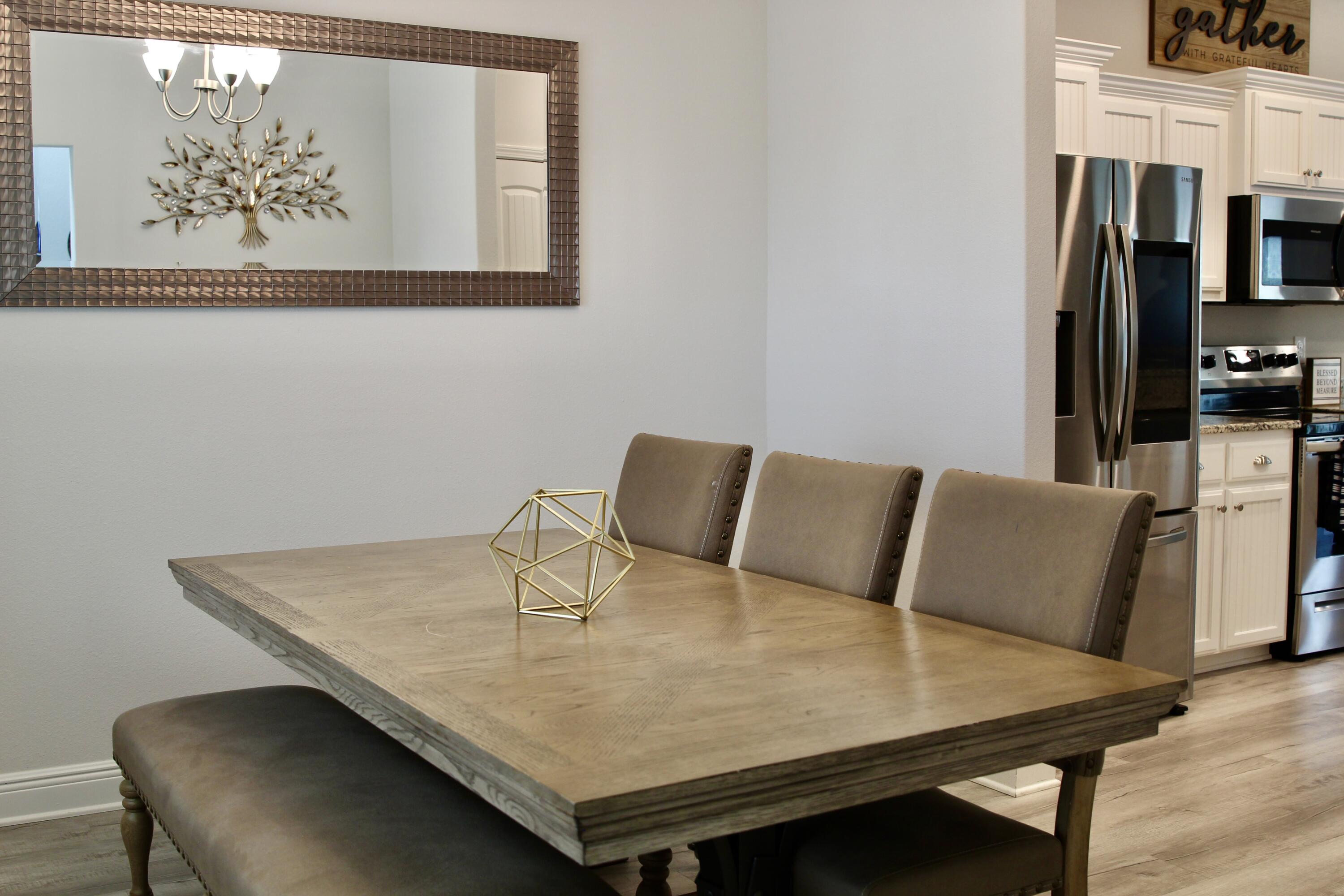 5755 Marigold Loop Crestview, FL 32539 - Photo 29 of 74 a view of a dining room with furniture