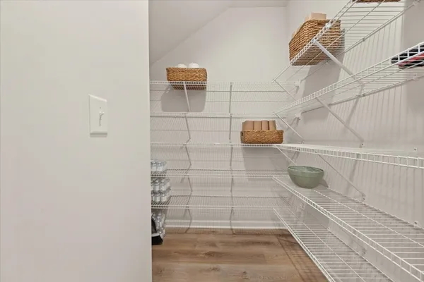 a kitchen with a sink stove and microwave