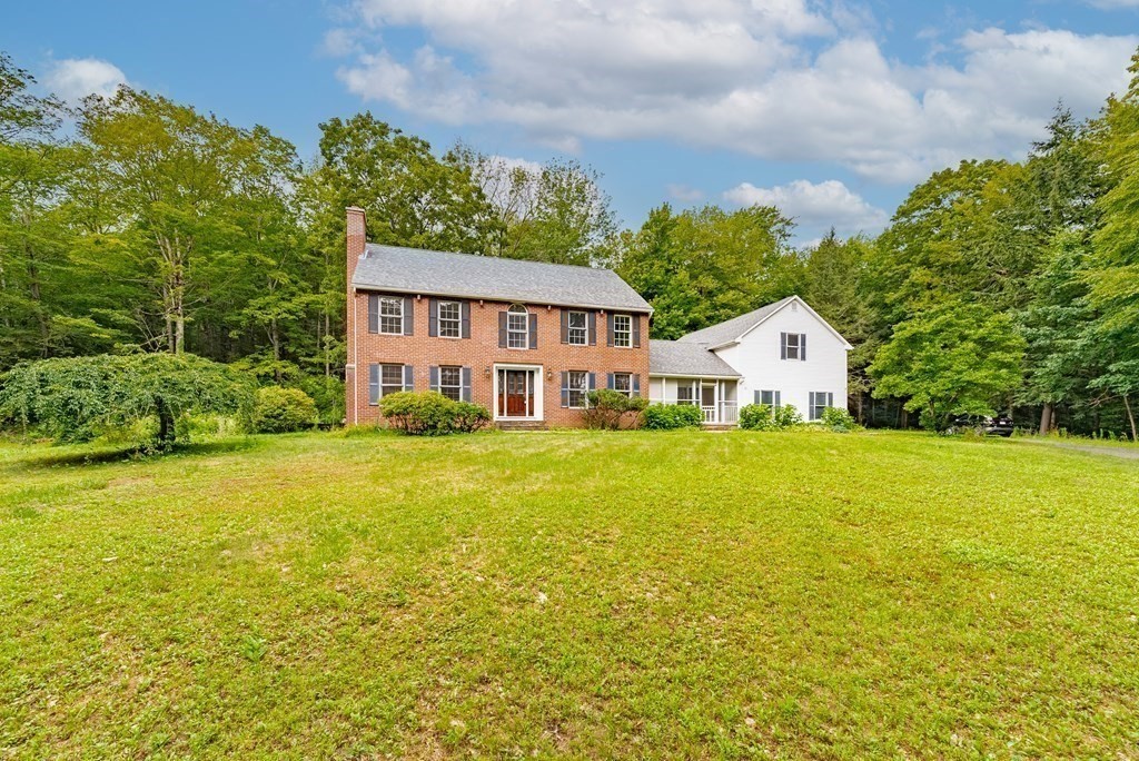 218 N Road Westhampton, MA 01027 - Photo 1 of 42 a view of a house with a backyard