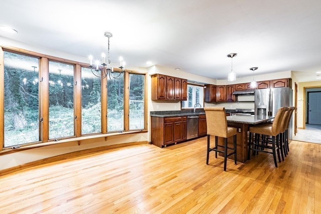218 N Road Westhampton, MA 01027 - Photo 13 of 42 a view of a dining room with furniture window and wooden floor