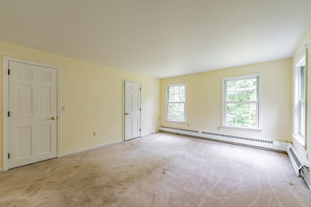218 N Road Westhampton, MA 01027 - Photo 31 of 42 a view of an empty room with a window