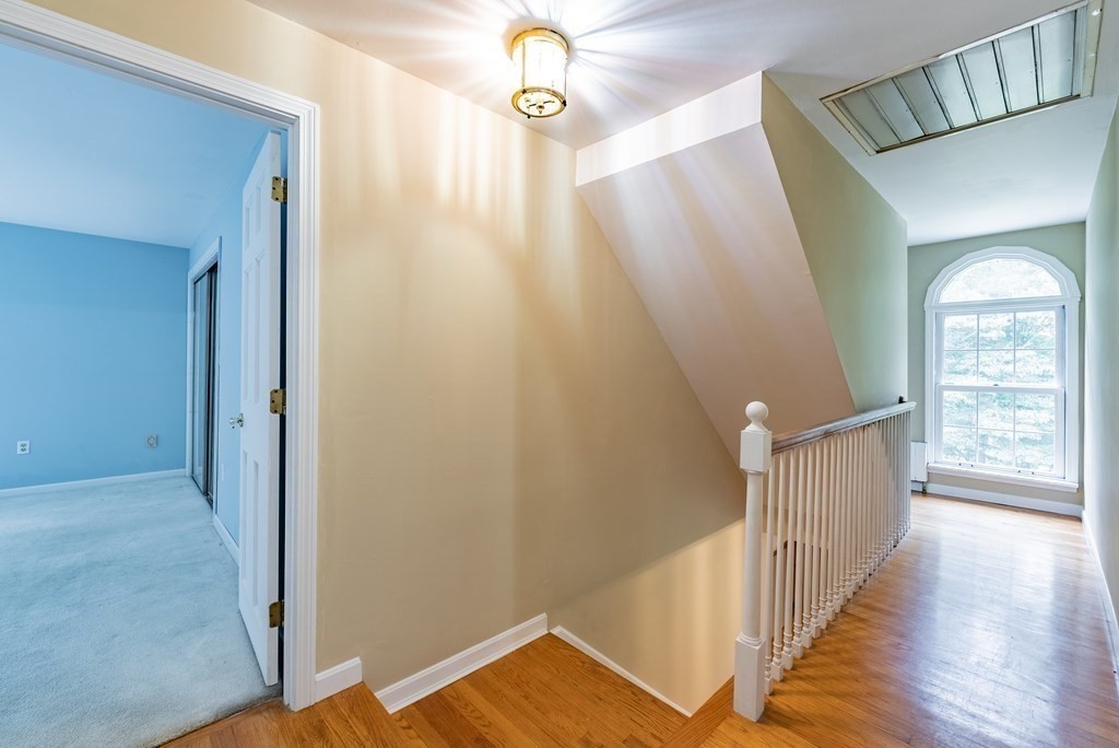 218 N Road Westhampton, MA 01027 - Photo 33 of 42 a view of a hallway view with wooden floor and staircase