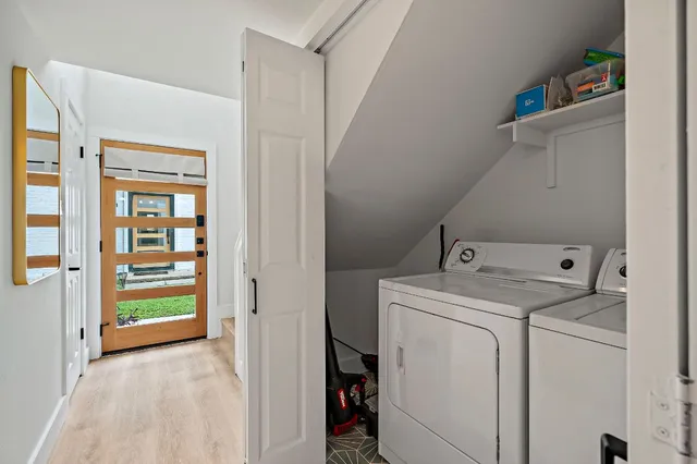 a utility room with dryer and washer