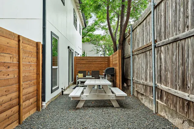 a front view of a house with parking area