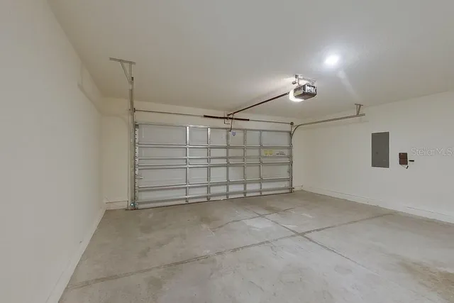 a view of an empty room with stairs