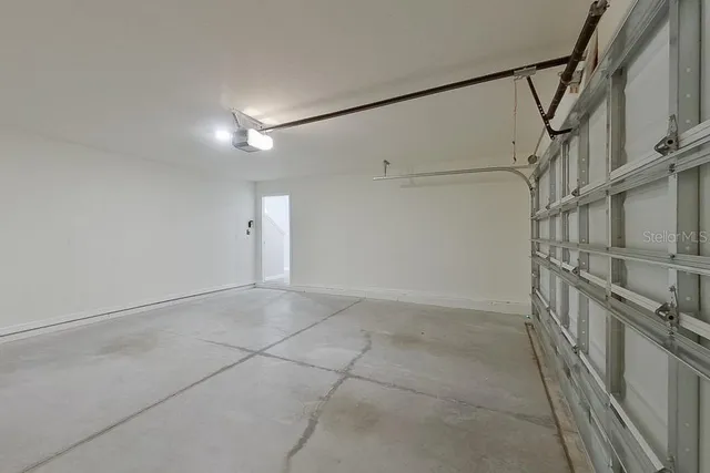 a front view of a house with a big yard