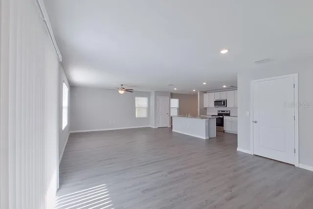 a view of kitchen and windows