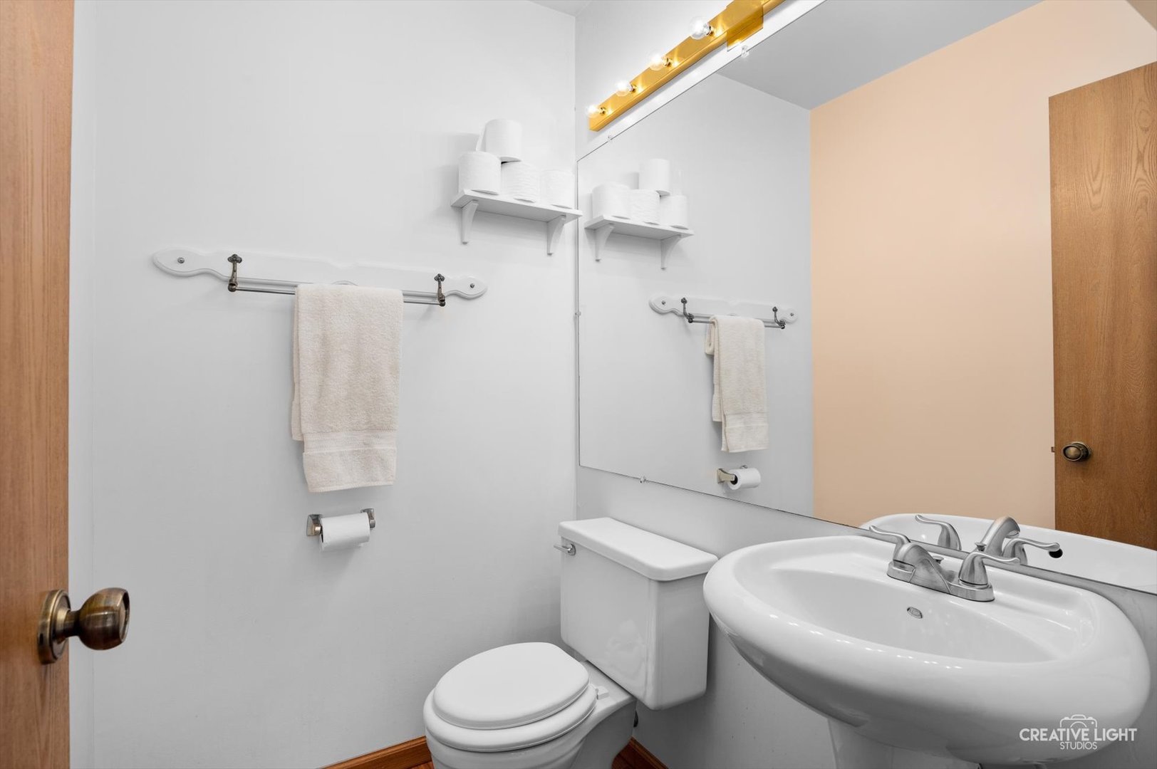 7419 Canterbury Place Downers Grove, IL 60516 - Photo 10 of 17 a bathroom with a sink toilet and shower