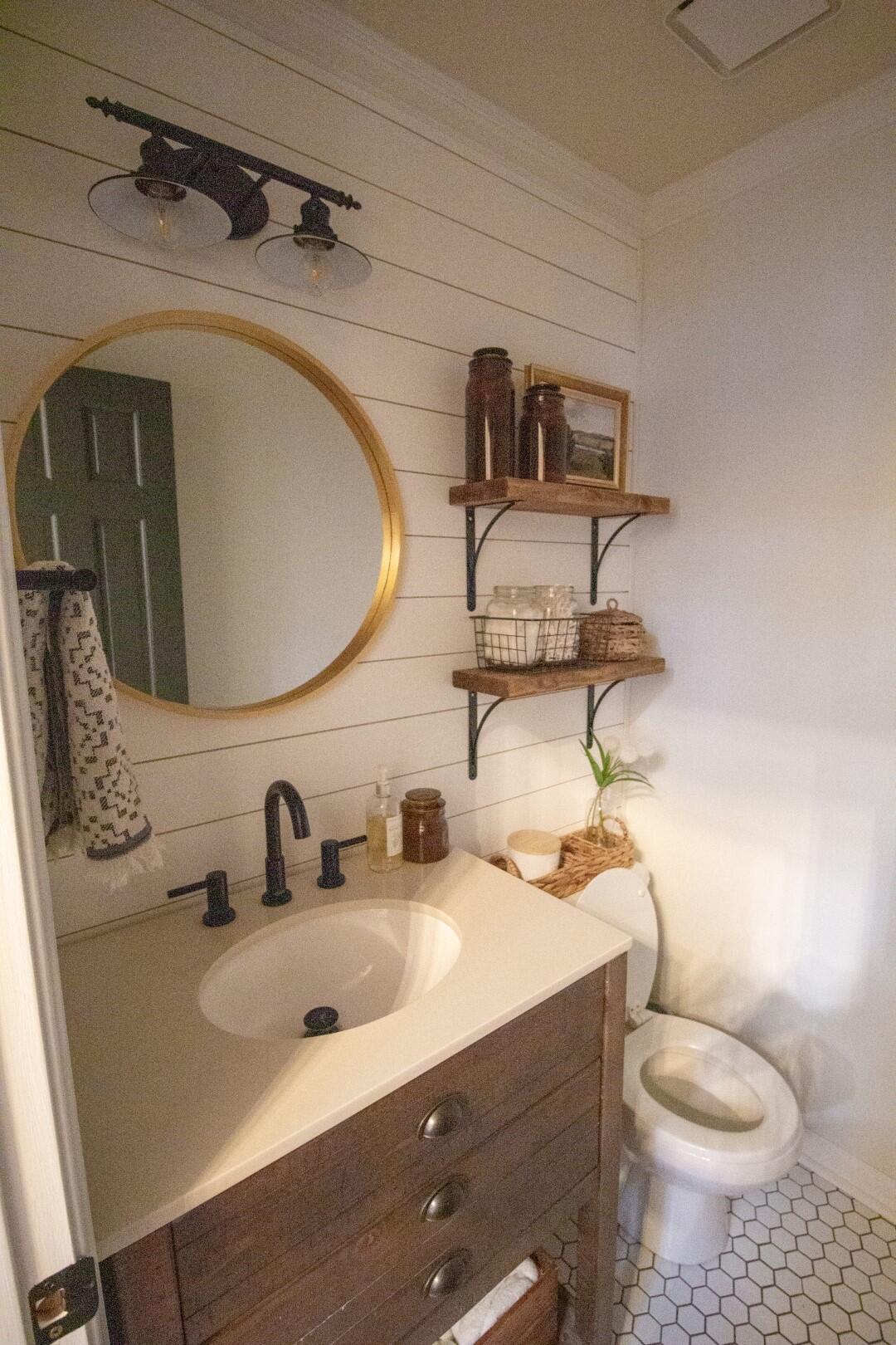 2420 Roaring Run Road Goode, VA 24556 - Photo 19 of 53 a bathroom with a sink toilet and mirror