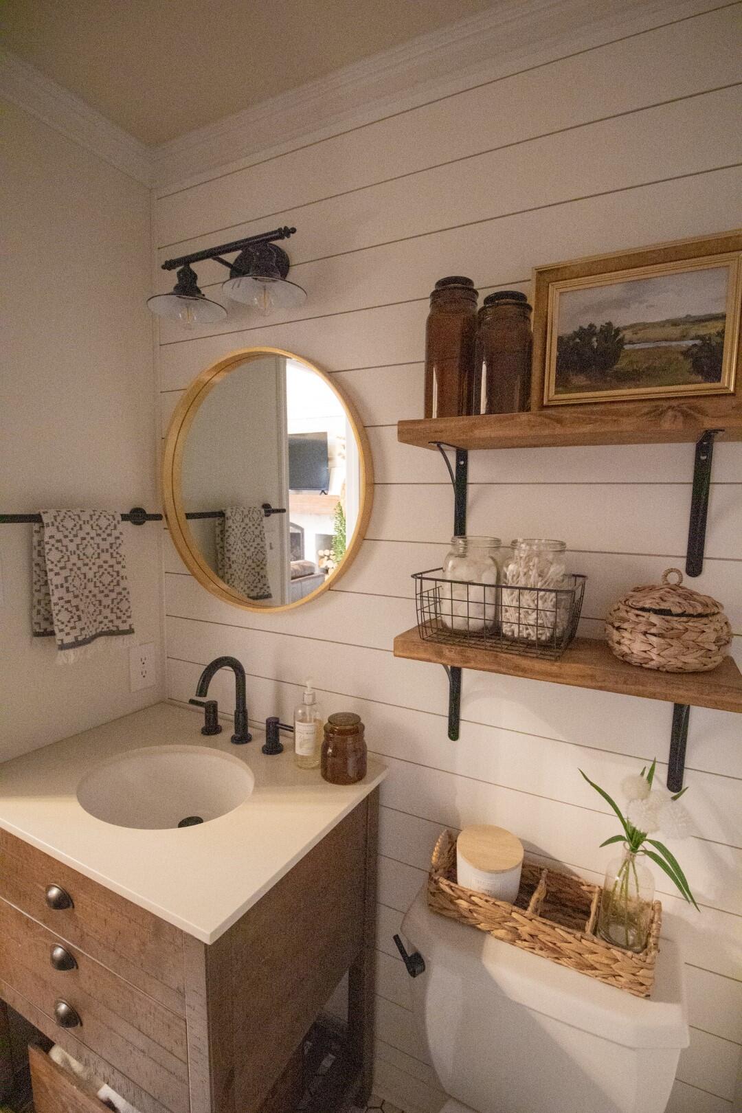 2420 Roaring Run Road Goode, VA 24556 - Photo 20 of 53 a bathroom with a sink and a mirror