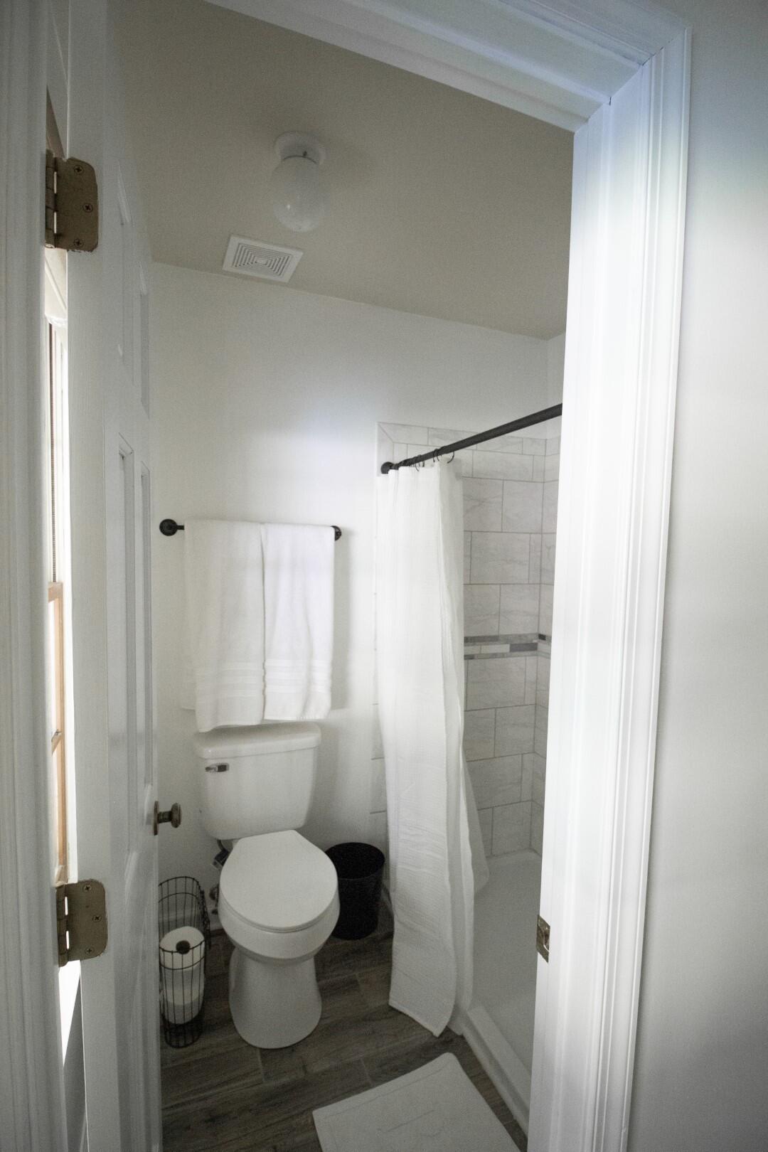 2420 Roaring Run Road Goode, VA 24556 - Photo 3 of 53 a bathroom with a toilet and a shower