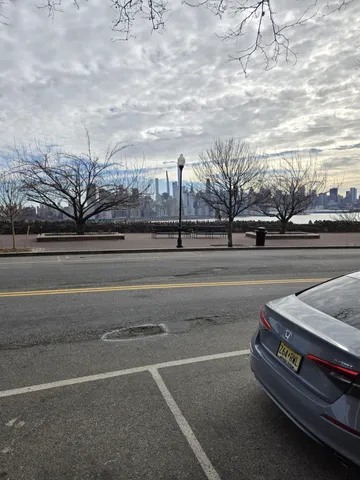 a view of street from balcony