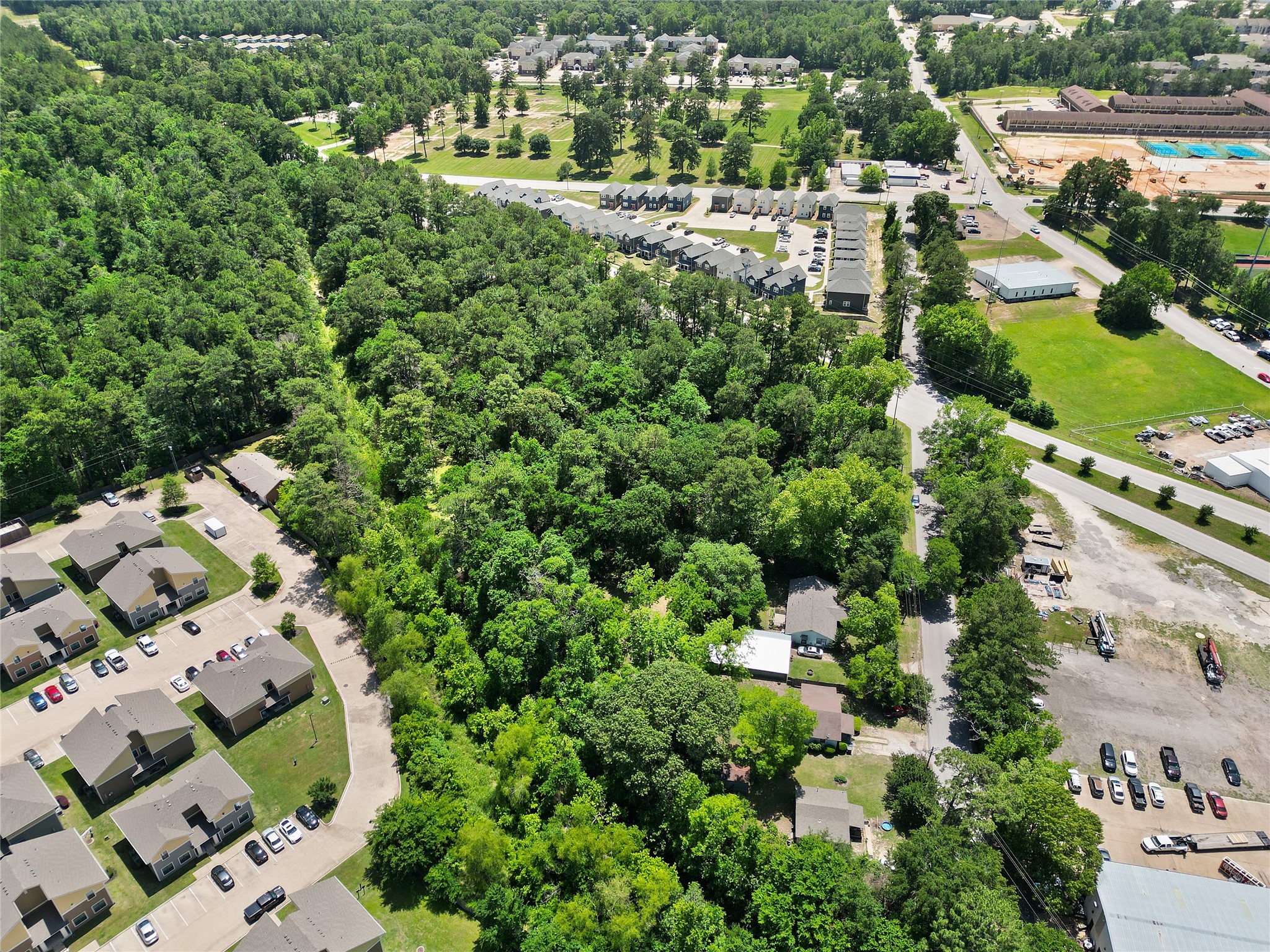 Tbd Tbd Bearkat Huntsville, TX 77340 - Photo 13 of 15 an aerial view of a city with lots of residential buildings