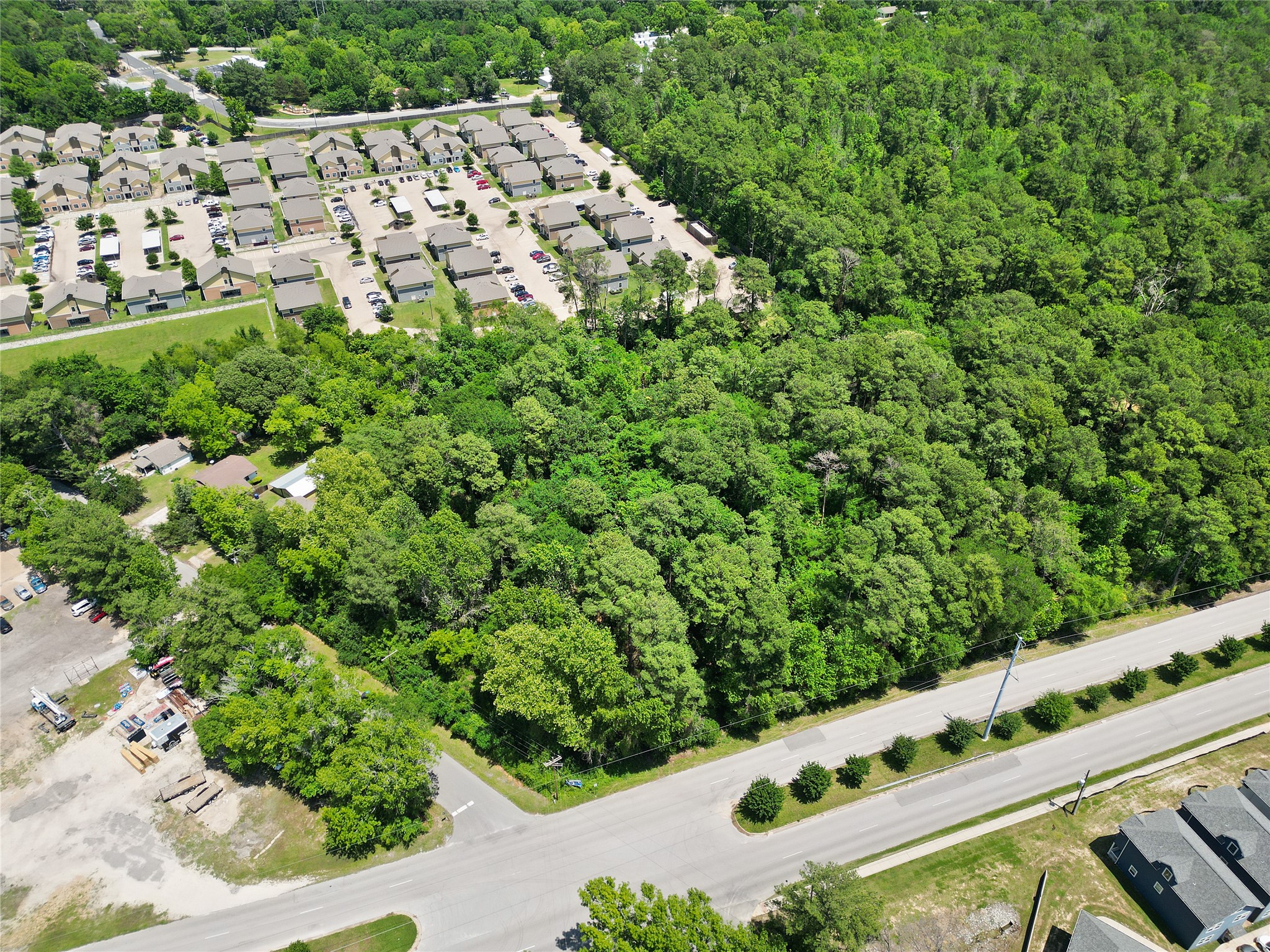 Tbd Tbd Bearkat Huntsville, TX 77340 - Photo 3 of 15 an aerial view of a residential houses with yard