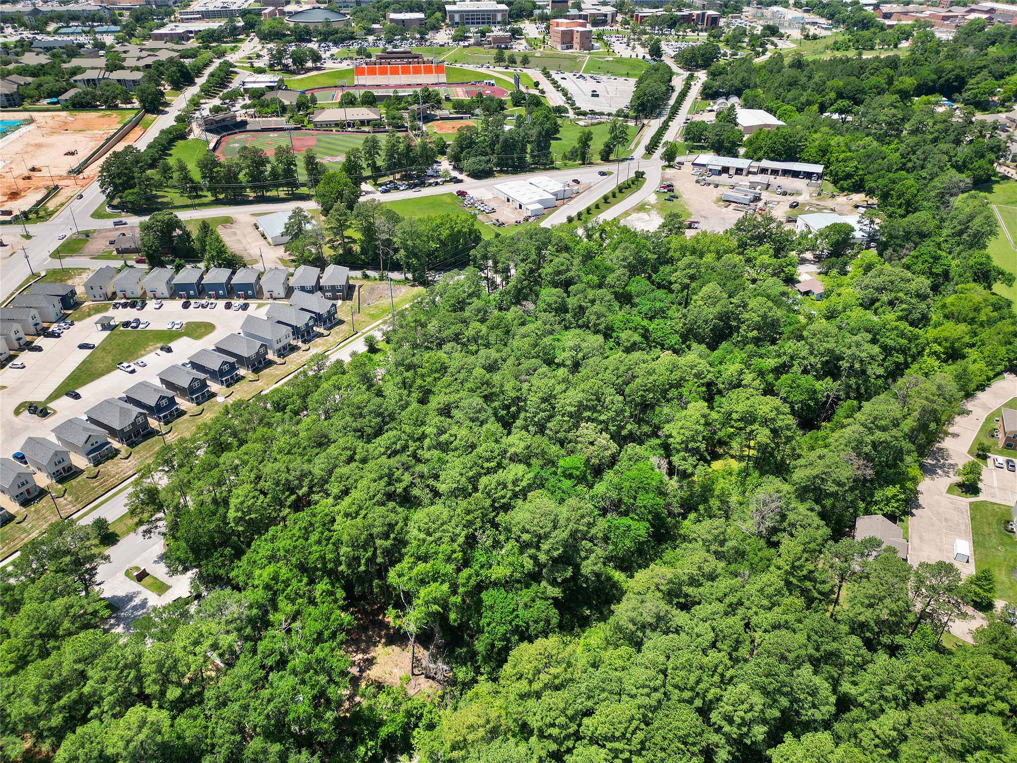 Tbd Tbd Bearkat Huntsville, TX 77340 - Photo 10 of 15 an aerial view of residential houses with outdoor space and trees