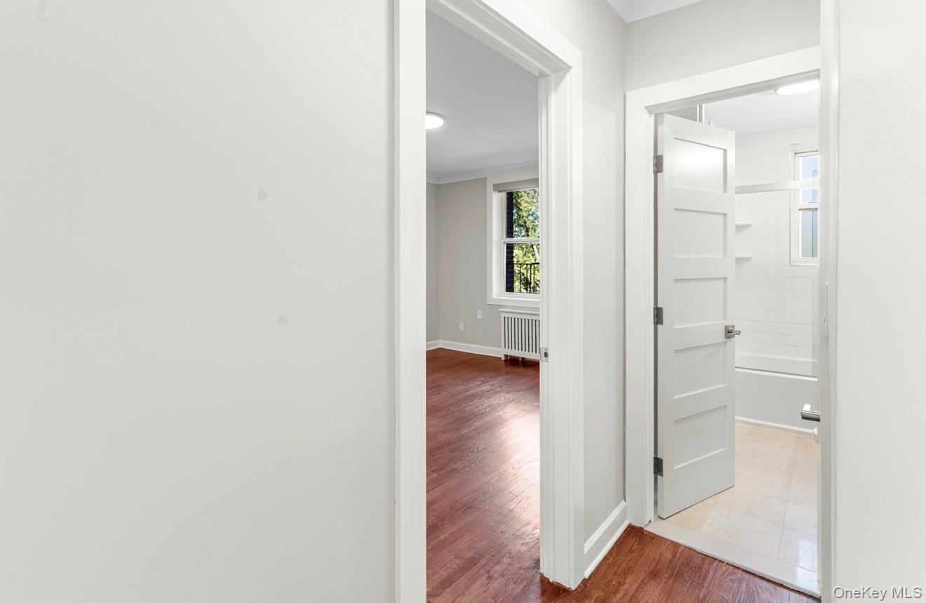 1133 Midland Avenue, Unit 3D Bronxville, NY 10708 - Photo 11 of 20 a view of a hallway with wooden floor