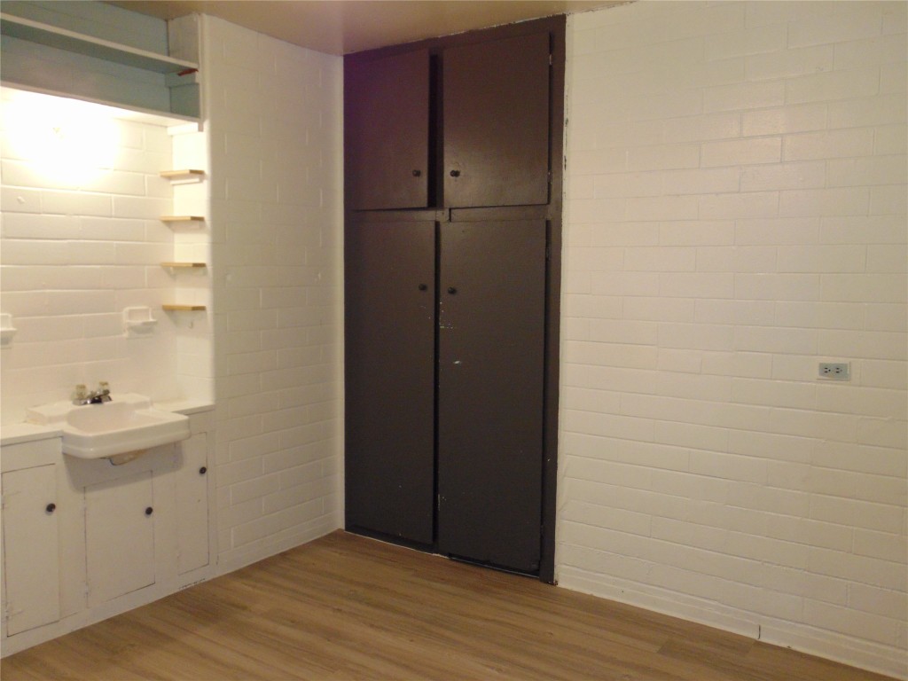 1701 East 38th Street, Unit 1611 Austin, TX 78722 - Photo 6 of 9 a view of a bathroom with a sink