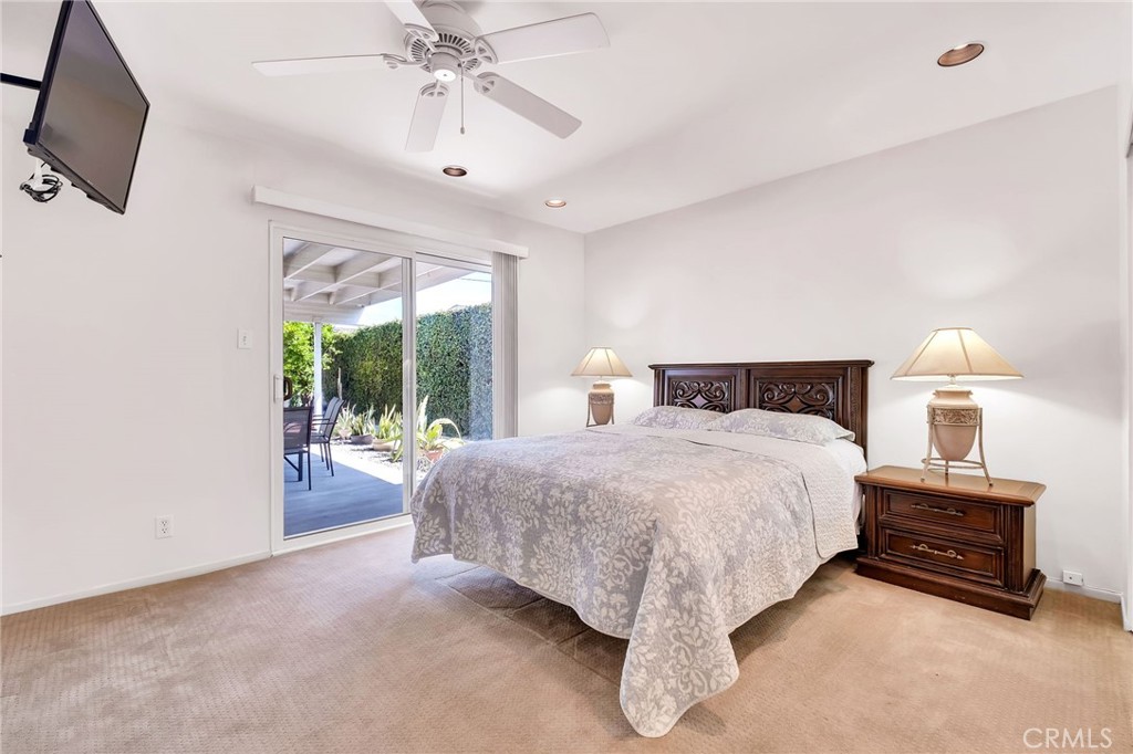 1607 Blackwall Drive Simi Valley, CA 93063 - Photo 18 of 47 a spacious bedroom with a bed and a chandelier