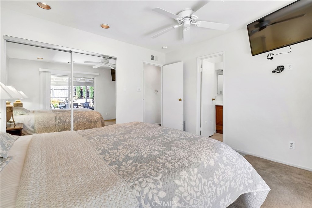 1607 Blackwall Drive Simi Valley, CA 93063 - Photo 19 of 47 a bedroom with a bed window and flat screen tv