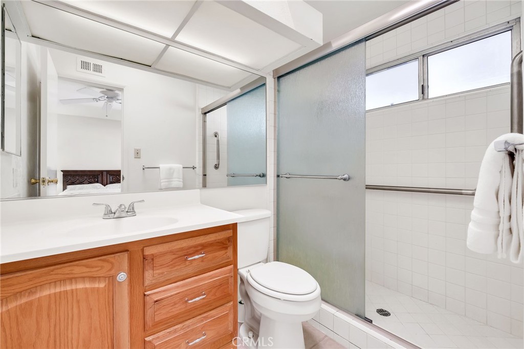 1607 Blackwall Drive Simi Valley, CA 93063 - Photo 20 of 47 a bathroom with a sink a toilet and shower