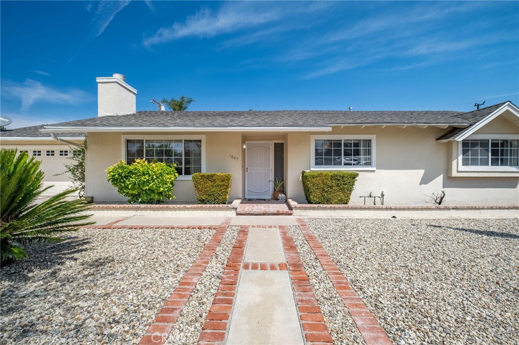 1607 Blackwall Drive Simi Valley, CA 93063 - Photo 2 of 47 a view of a house with a yard