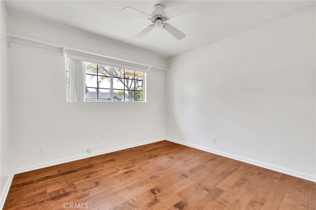 1607 Blackwall Drive Simi Valley, CA 93063 - Photo 22 of 47 an empty room with a window and ceiling fan