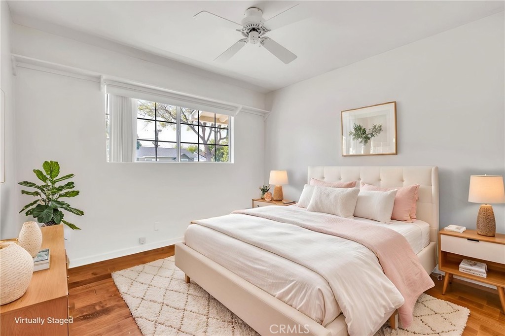 1607 Blackwall Drive Simi Valley, CA 93063 - Photo 23 of 47 a bedroom with a bed and a potted plant