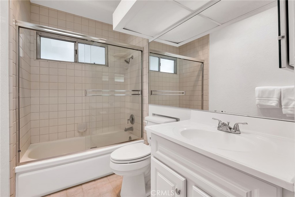1607 Blackwall Drive Simi Valley, CA 93063 - Photo 28 of 47 a bathroom with a bathtub shower sink vanity and toilet