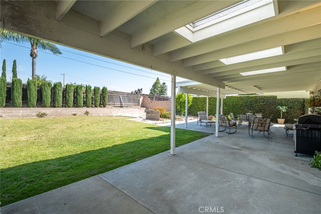 1607 Blackwall Drive Simi Valley, CA 93063 - Photo 32 of 47 a view of swimming pool with lawn chairs potted plants and large tree