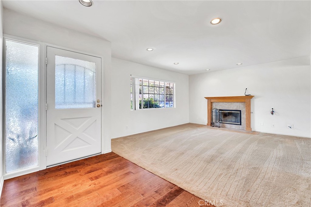 1607 Blackwall Drive Simi Valley, CA 93063 - Photo 4 of 47 an empty room with windows and fireplace